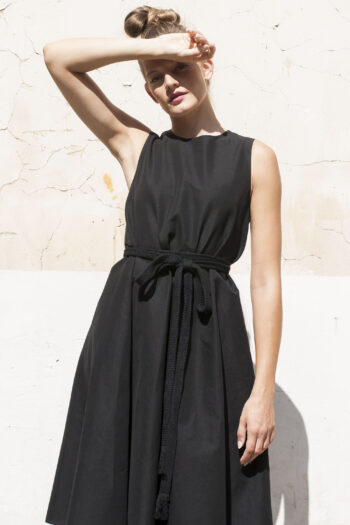 A shaped black linen dress with a belt front • Sassa Björg