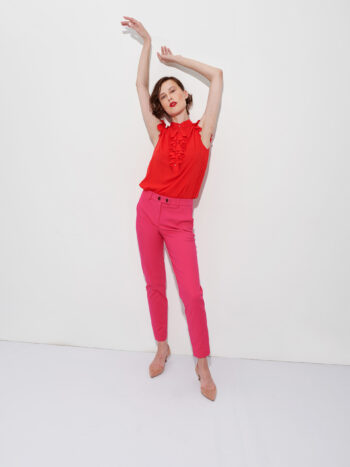 sleeveless crimson red jabot ruffle top arms up • Sassa Björg