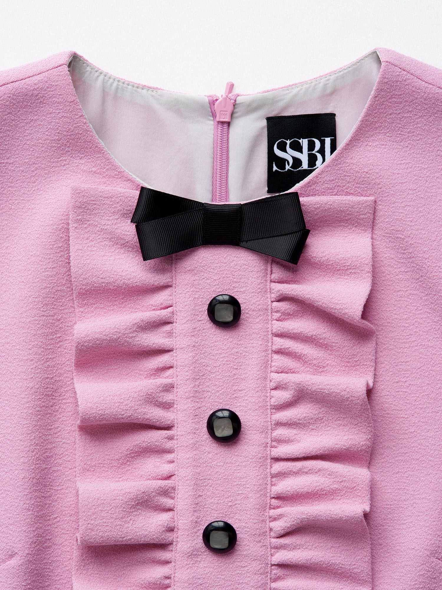 little pink dress with ruffle closeup • Sassa Björg