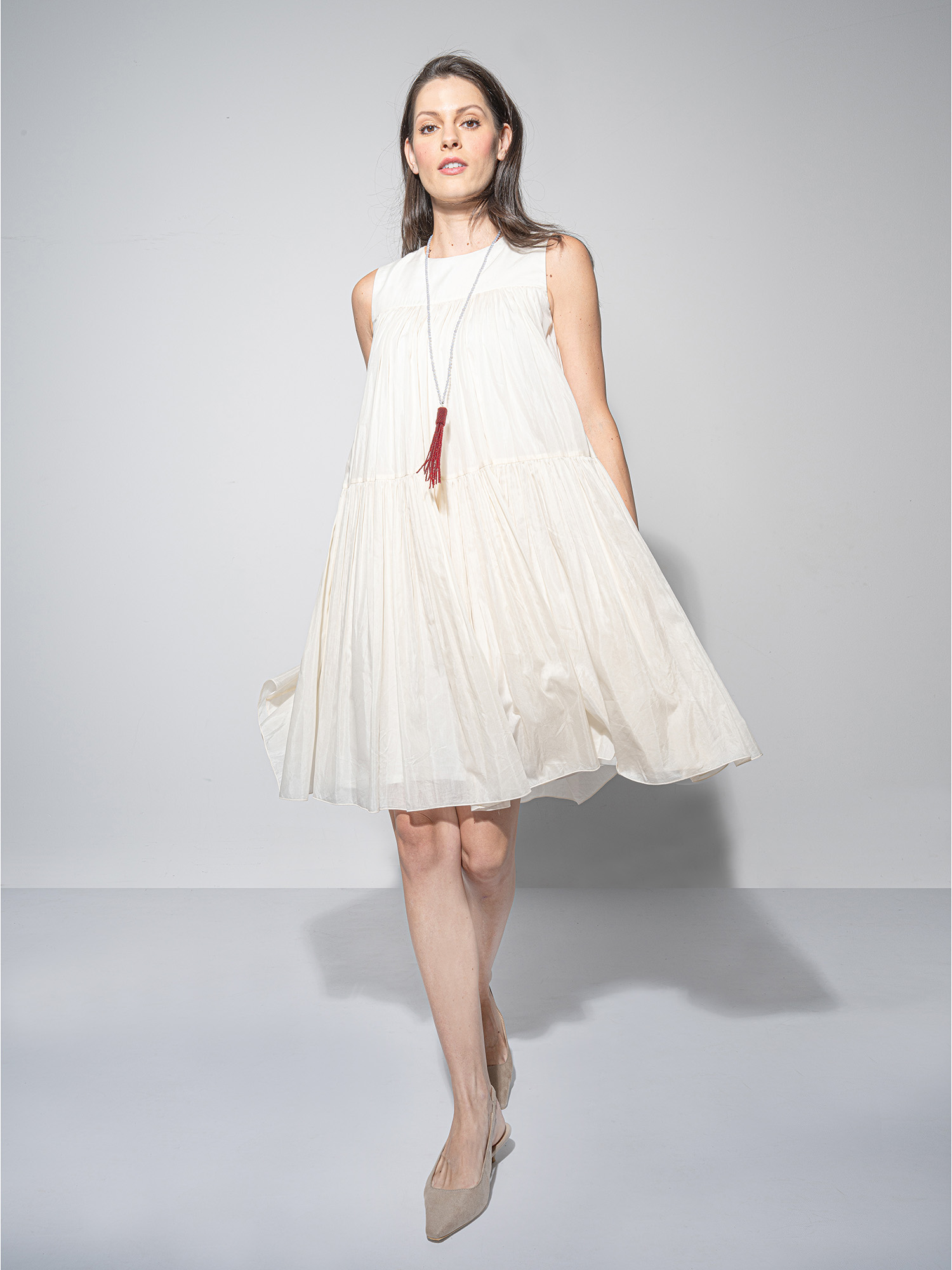silky dream ivory tiered dress walking • Sassa Björg