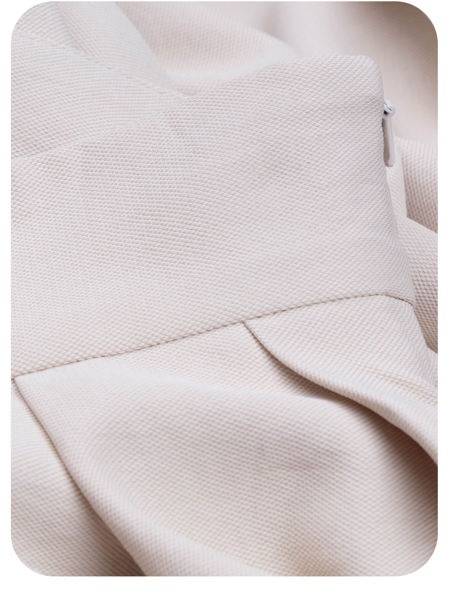 cream pleated midi skirt with soft drape fabric