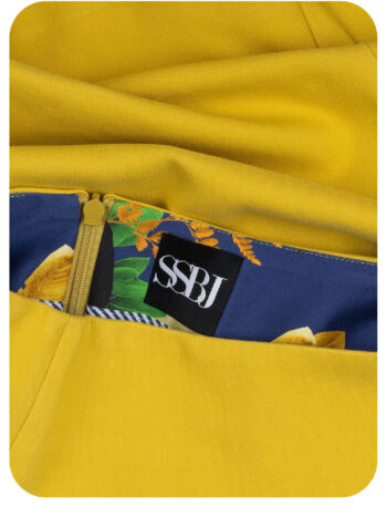 mustard a-line mini skirt in cotton with structured shape closeup