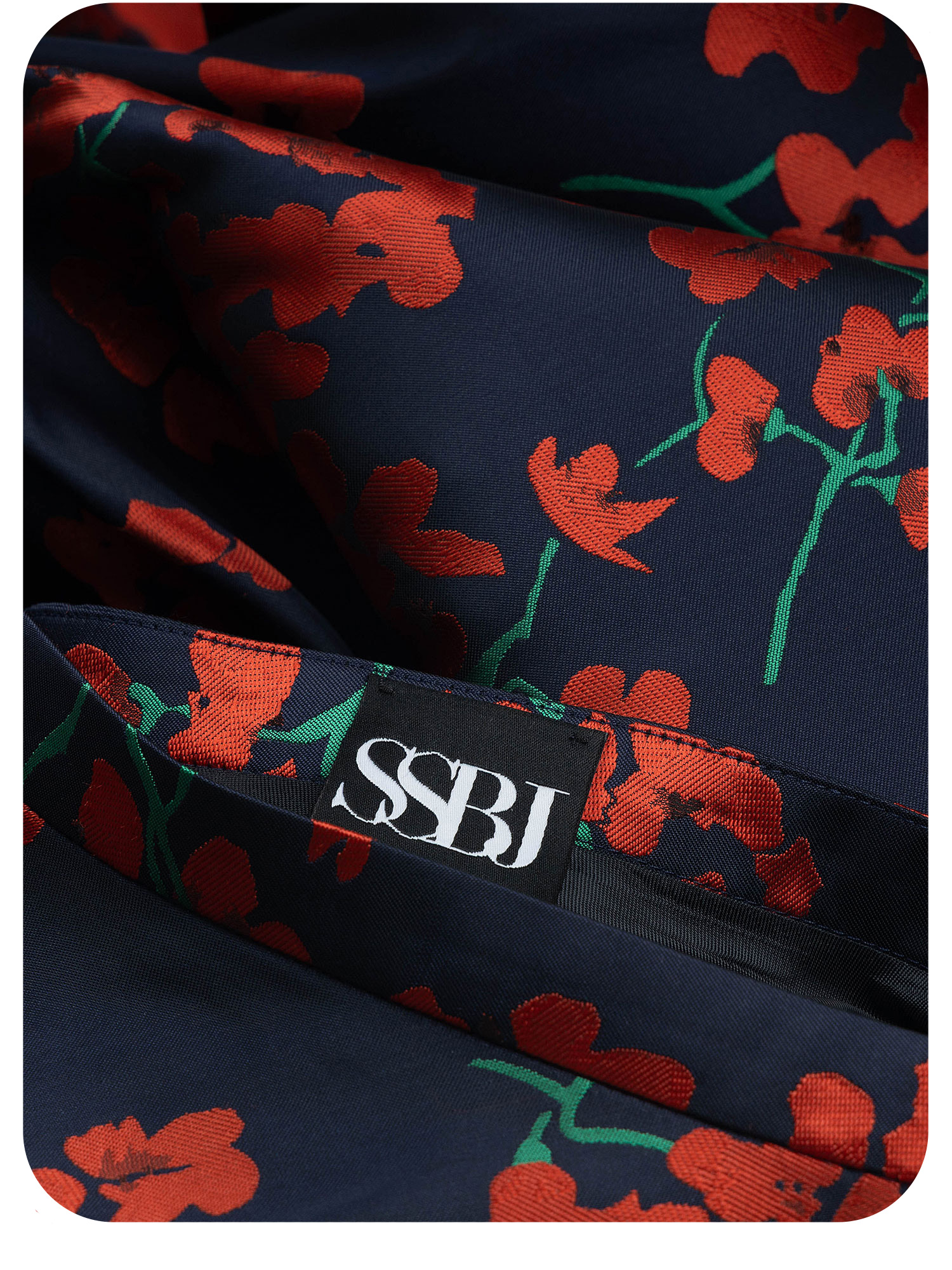 navy floral jacquard maxi skirt with structured silhouette fabric